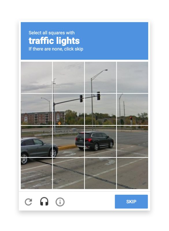 A reCAPTCHA quiz prompting the user to select all squares with traffic lights